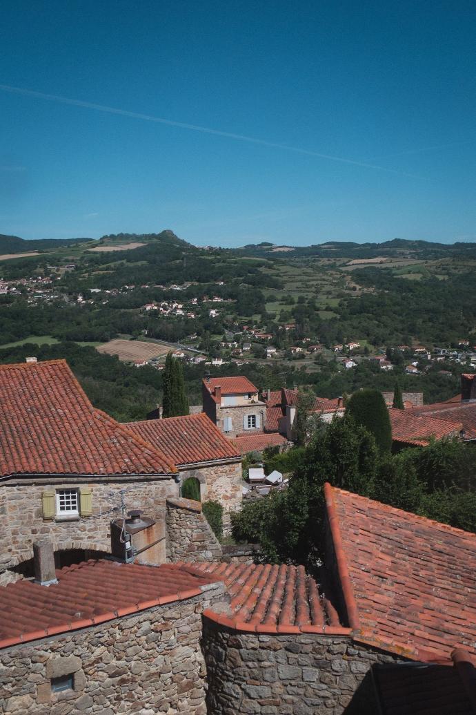 a view of a village from a hill